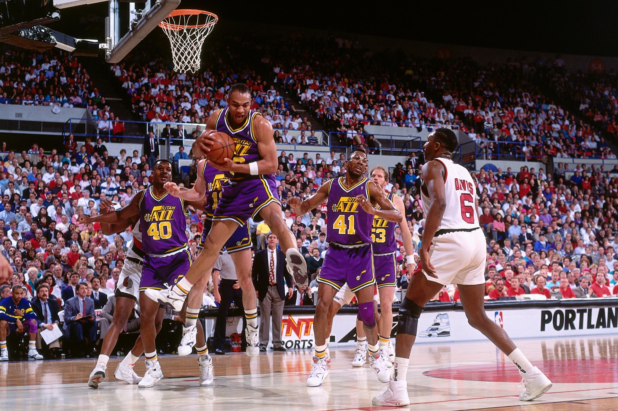 PORTLAND, OR - CIRCA 1990: Blue Edwards #30 of the Utah Jazz rebounds against the Portland Trailblazers circa 1990 at the Veterans Memorial Coliseum in Portland, Oregon. NOTE TO USER: User expressly acknowledges and agrees that, by downloading and or using this photograph, User is consenting to the terms and conditions of the Getty Images License Agreement. Mandatory Copyright Notice: Copyright 1990 NBAE (Photo by Brian Drake/NBAE via Getty Images)