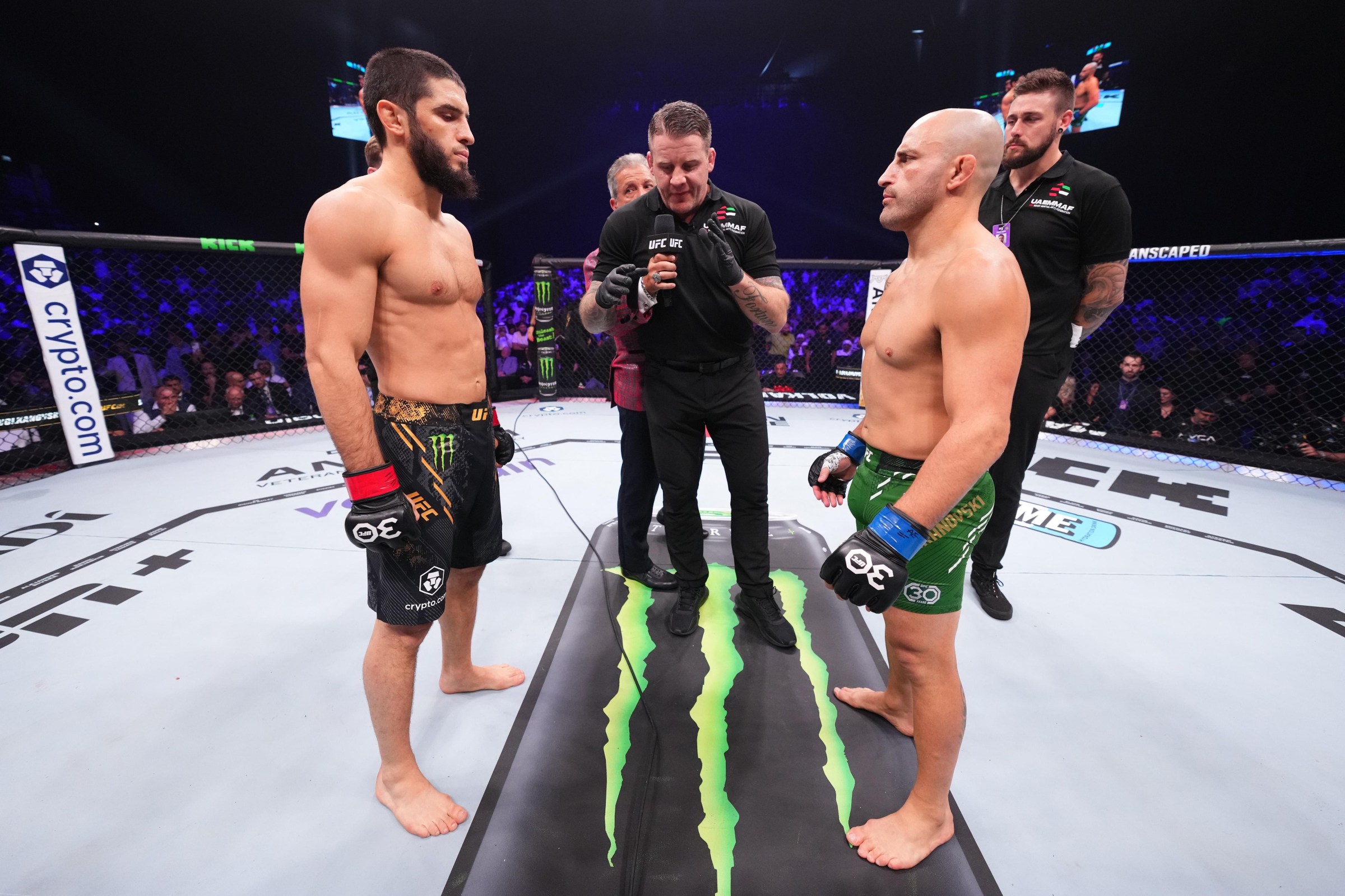 ABU DHABI, UNITED ARAB EMIRATES - OCTOBER 21: (L-R) Opponents Islam Makhachev of Russia and Alexander Volkanovski of Australia face off prior to the UFC lightweight championship fight during the UFC 294 event at Etihad Arena on October 21, 2023 in Abu Dhabi, United Arab Emirates. (Photo by Chris Unger/Zuffa LLC via Getty Images)