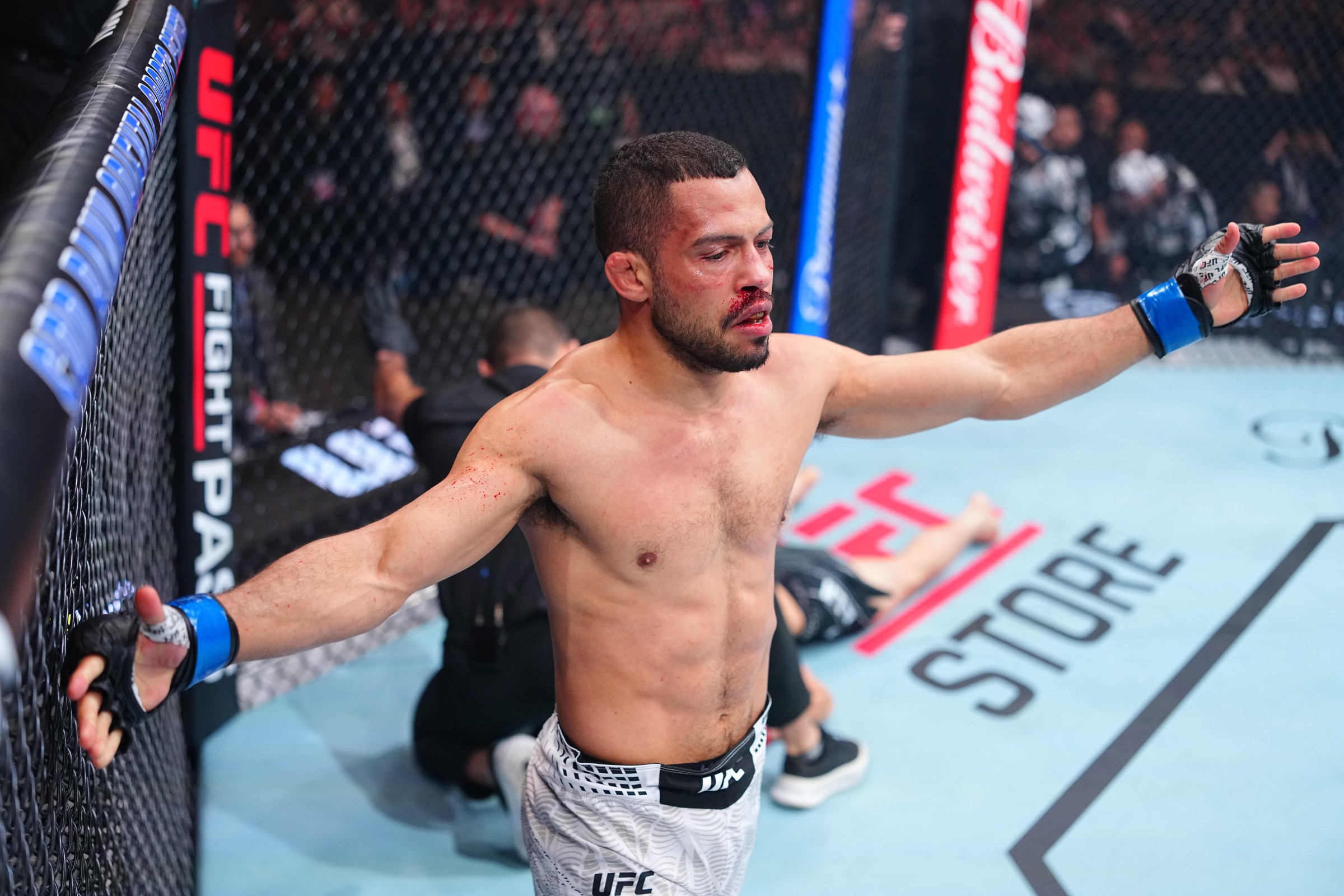 SHANGHAI, CHINA - AUGUST 29: Hector Santiago of Brazil reacts after a knockout victory against Lawrence Lui of China in a bantamweight fight during the UFC Fight Night event at SPD Bank Oriental Sports Center on August 29, 2026 in Shanghai, China. (Photo by Chris Unger/Zuffa LLC)