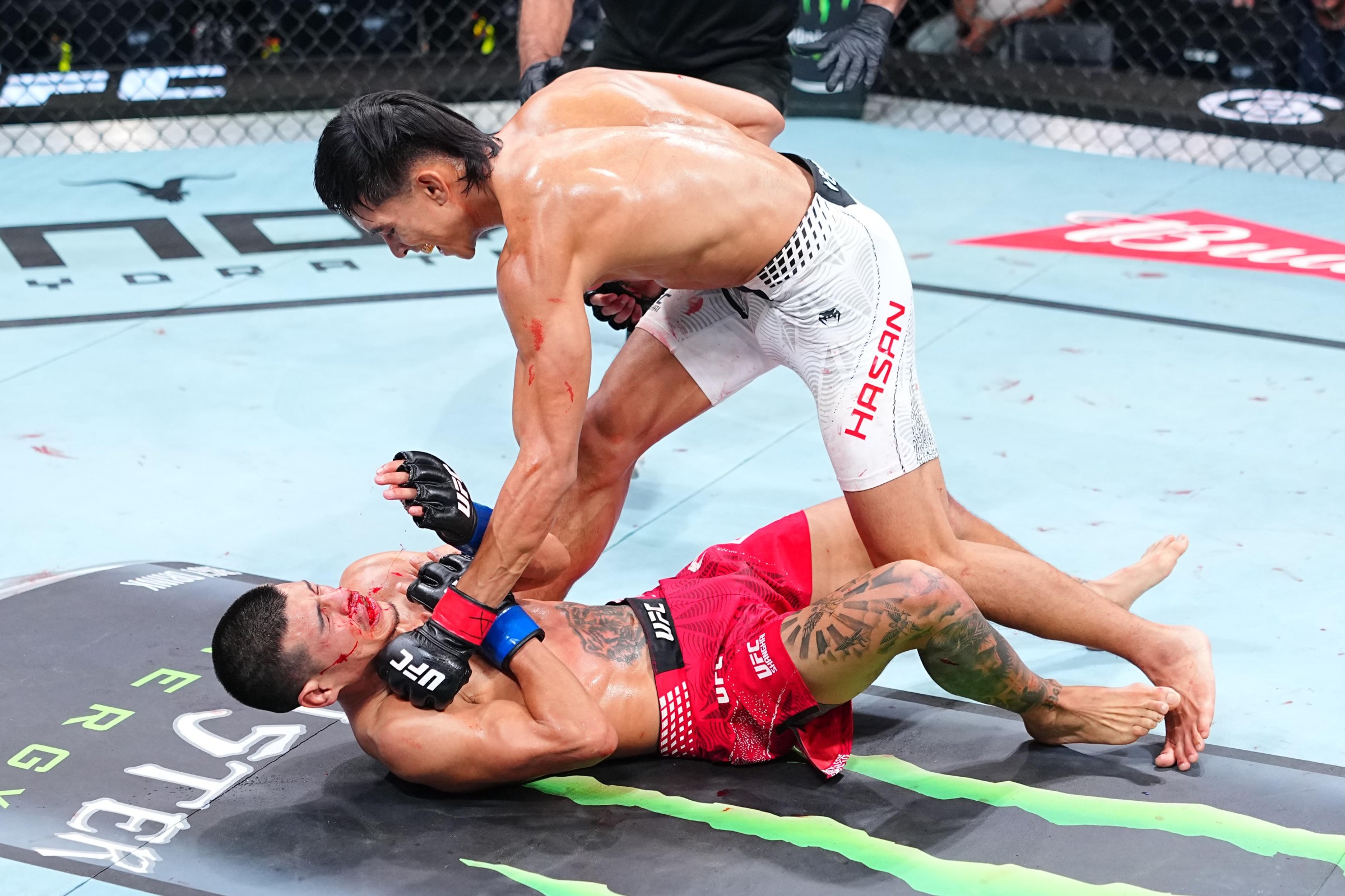 SHANGHAI, CHINA - AUGUST 29: Bilal Hasan knocks out Nilson Rojas of Peru in a flyweight fight during the UFC Fight Night event at SPD Bank Oriental Sports Center on August 29, 2026 in Shanghai, China. (Photo by Chris Unger/Zuffa LLC)