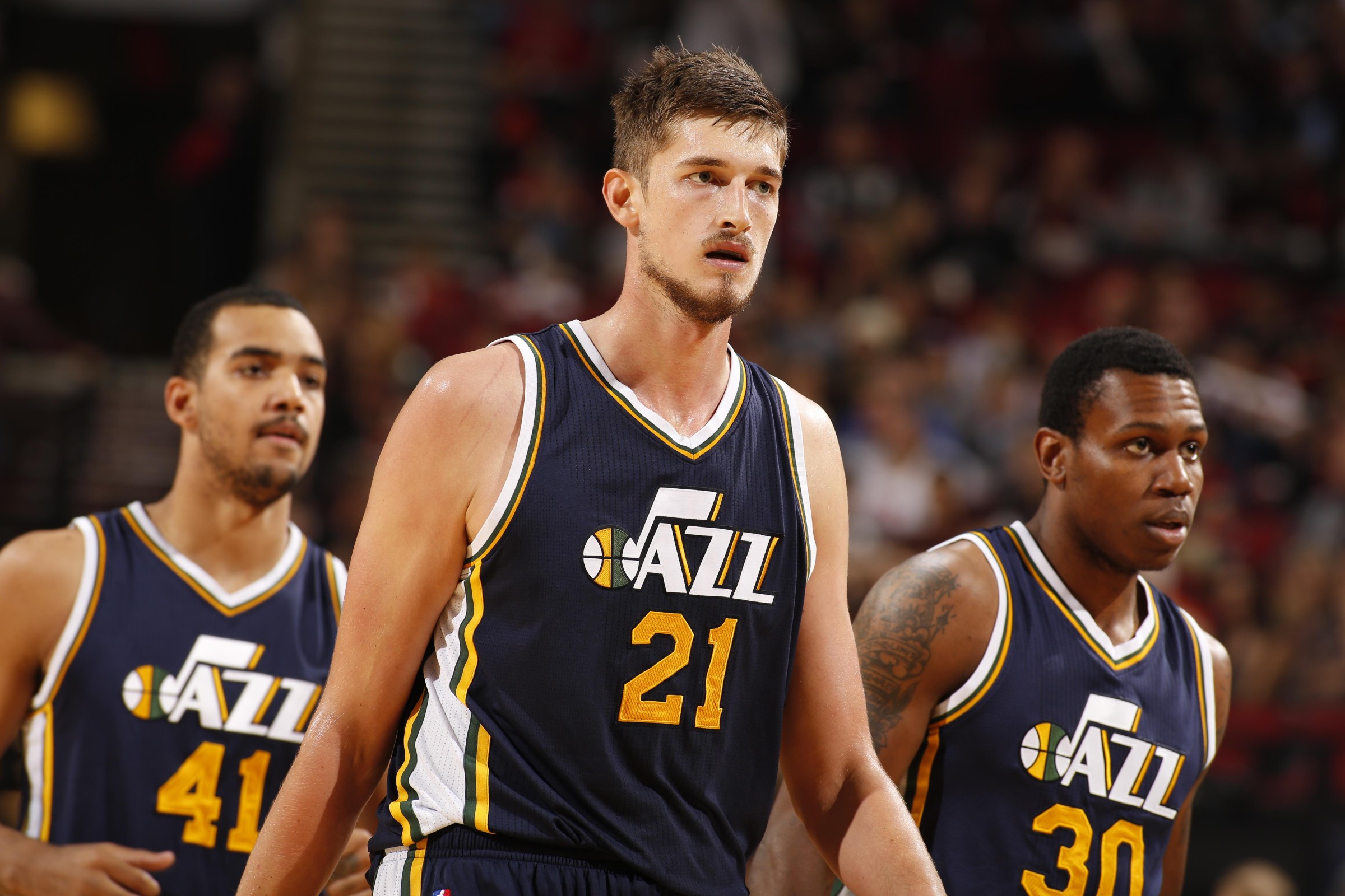 PORTLAND, OR - OCTOBER 18: Tibor Pleiss #21 of the Utah Jazz looks on during the game against the Portland Trail Blazers on October 18, 2015 at the Moda Center in Portland, Oregon. NOTE TO USER: User expressly acknowledges and agrees that, by downloading and or using this Photograph, user is consenting to the terms and conditions of the Getty Images License Agreement. Mandatory Copyright Notice: Copyright 2015 NBAE (Photo by Cameron Browne/NBAE via Getty Images)