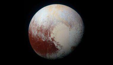 A view of a world with tan shades and a reddish area toward the bottom left of it.