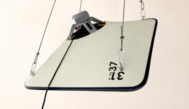 suspended open-baffle loudspeaker system made from concrete canvas