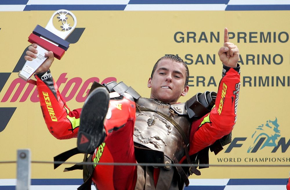 Lorenzo, celebrating in Roman army attire, added two 250cc titles to Aprilia's collection in 2006-07