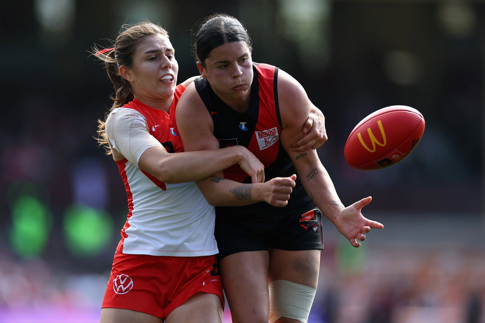 Maddie Prespakis (right) was dominant in the first half for Essendon.