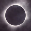 Baron views the beginning of a solar eclipse with friends in Western Australia in 2023. Baron says getting to see the solar corona during a total eclipse is "the most dazzling sight in the heavens."