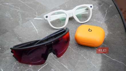 A collection of Meta smart glasses next to the Powerbeats Pro 2 case.