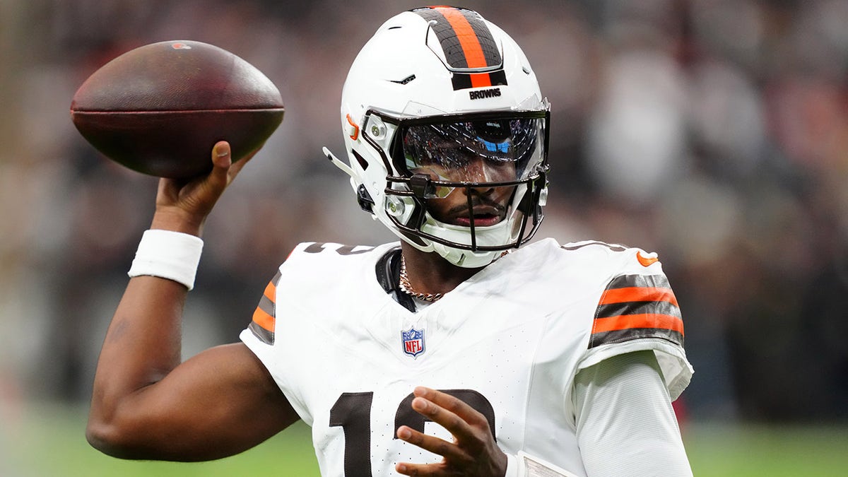 Shedeur Sanders drops back to pass