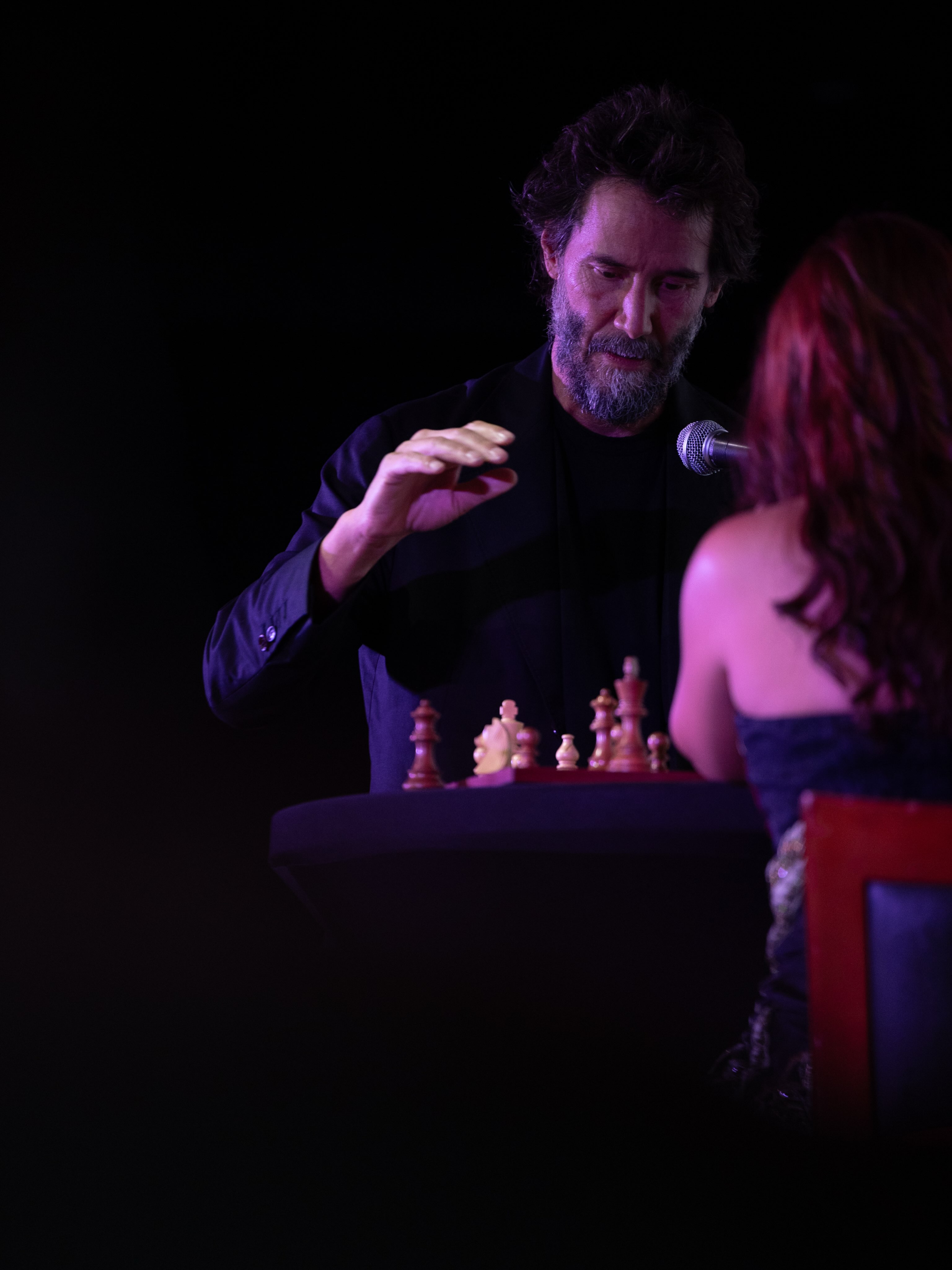 Keanu Reeves entertained the audience while playing chess on stage. Photo: Chicano Film Festival