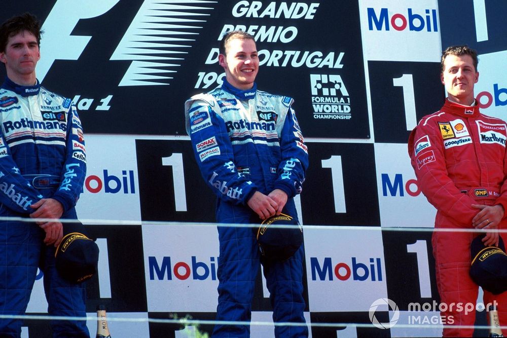 Villeneuve produced a stunning drive in Portugal to keep his title hopes alive
