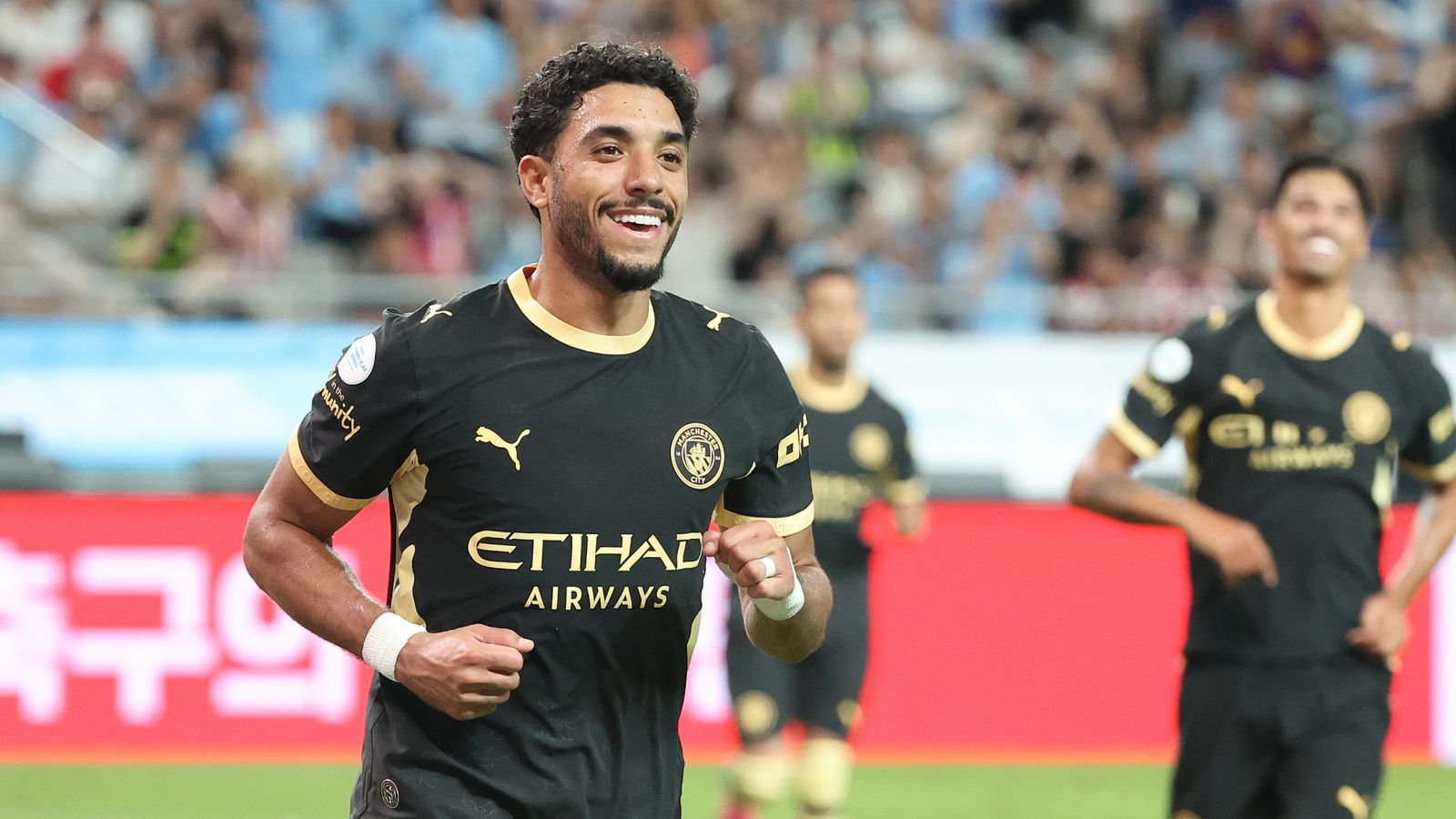 Omar Marmoush celebrates scoring against Atletico Madrid
