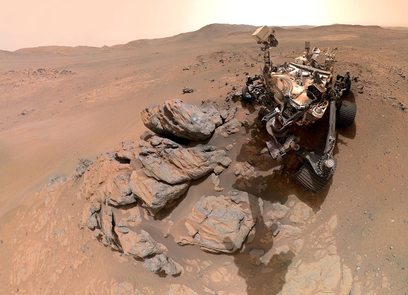 Mars has such thin air that around noon near the equator, sunlit ground beneath your boots could reach 24 degrees Celsius while the air around your head remained below freezing — allowing one standing person to span temperatures resembling spring and winter at the same time.