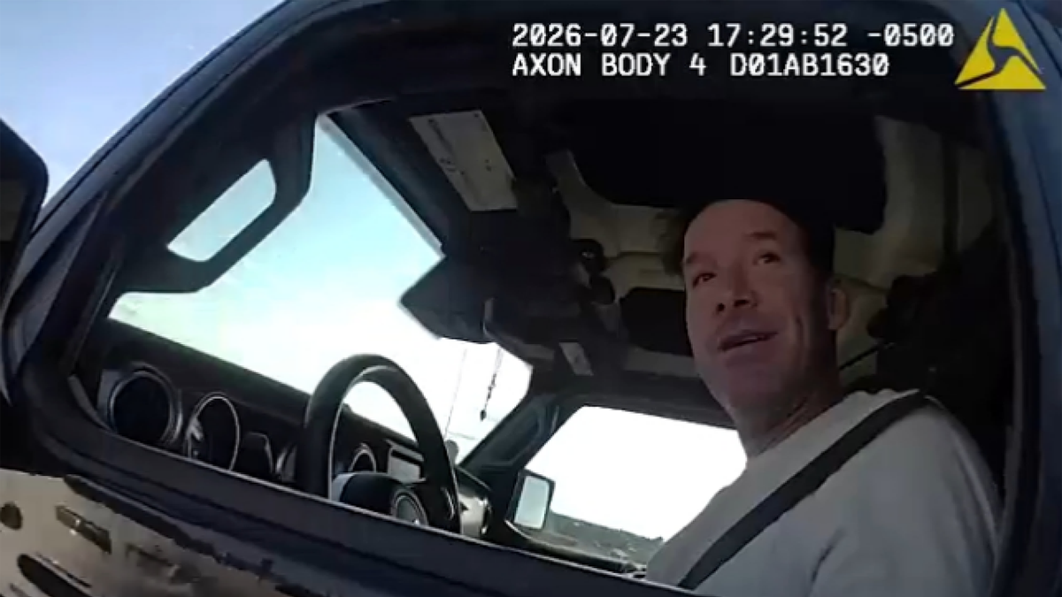 Ex-NFL quarterback Tony Romo during operating while intoxicated arrest on police bodycam footage.