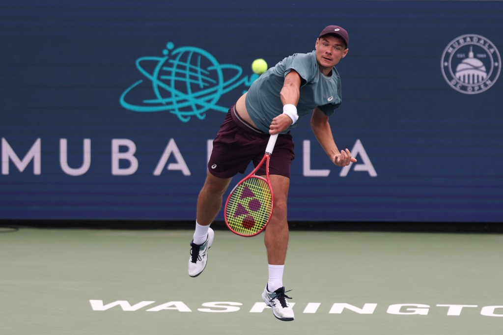 Kamil Majchrzak serving at the 2026 Mubadala DC Open.