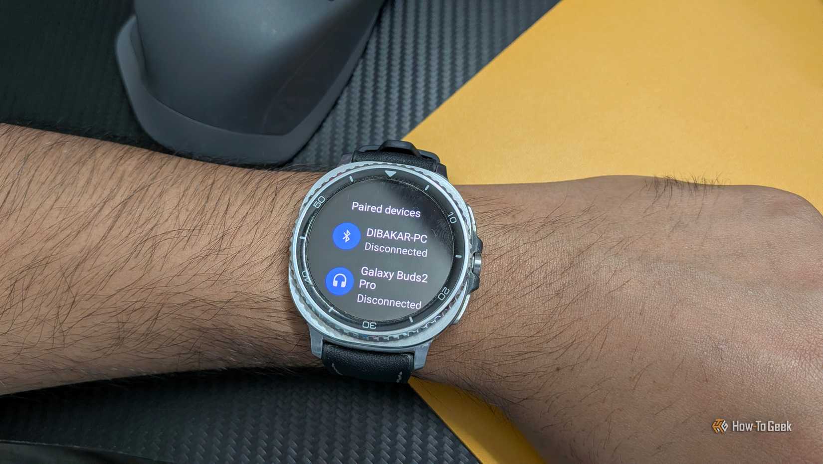 WearMouse paired devices screen on the Galaxy Watch listing DIBAKAR-PC and Galaxy Buds2 Pro as disconnected.