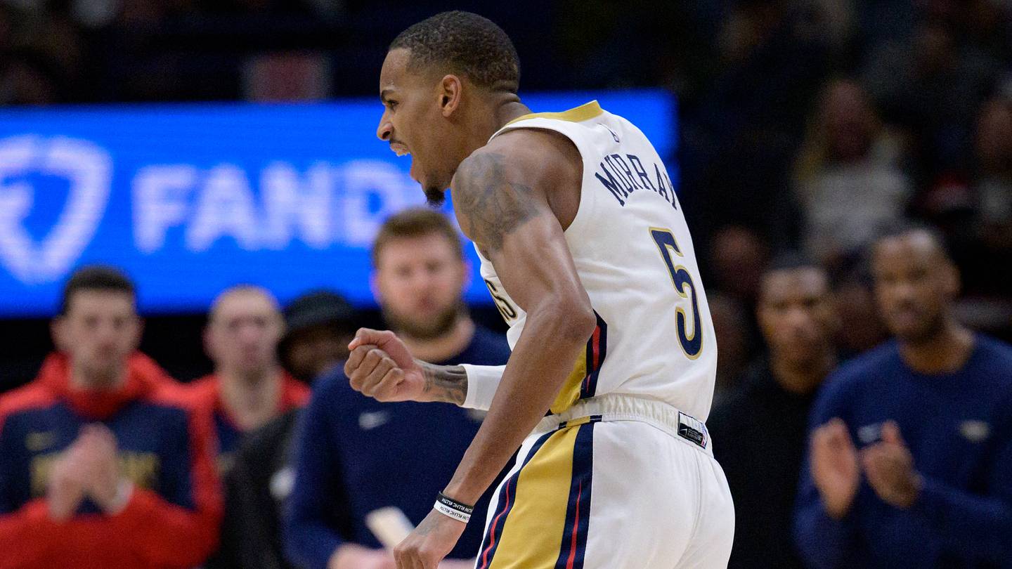 Jan 15, 2025; New Orleans, Louisiana, USA; New Orleans Pelicans guard Dejounte Murray (5) reacts after making a basket late in the fourth quarter against the Dallas Mavericks at Smoothie King Center. Mandatory Credit: Matthew Hinton-Imagn Images