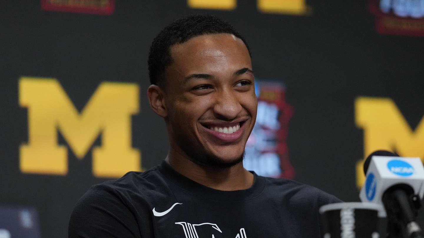 Apr 5, 2026; Indianapolis, IN, USA; Michigan Wolverines guard Nimari Burnett (4) during a press conference ahead of the Final Four of the men's 2026 NCAA Tournament at Lucas Oil Stadium. Mandatory Credit: Bob Donnan-Imagn Images