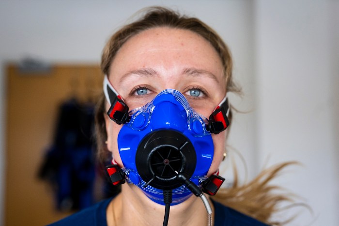 Close-up of Smith wearing a respiratory mask during the test, looking directly at the camera.
