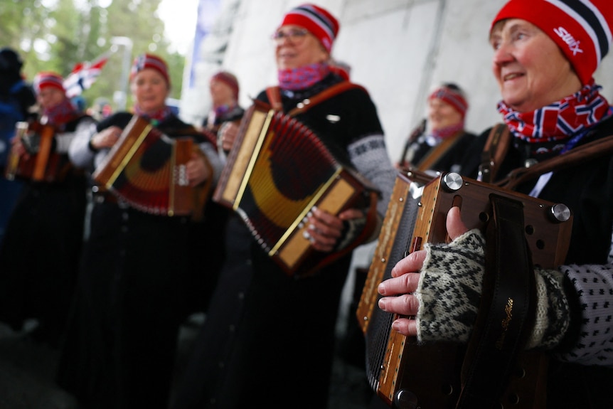 A group of Norwegians playing the accordion. 