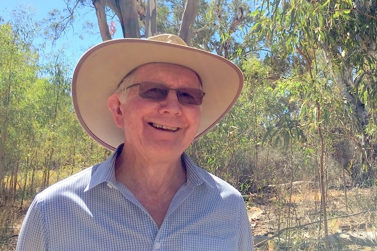 Bird watcher Kevin Smith standing in the forest on the Chowilla Floodplain.