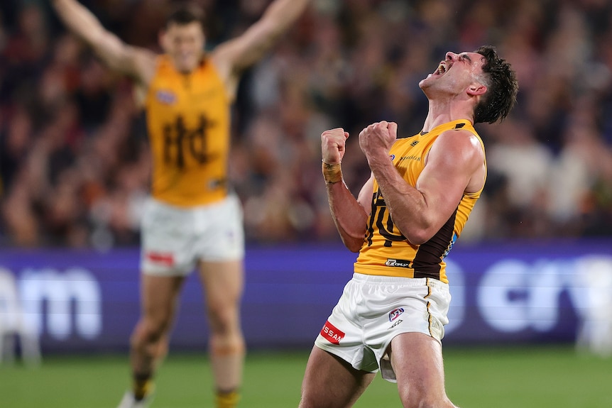Jai Newcombe clenches his fists and roars to the heavens
