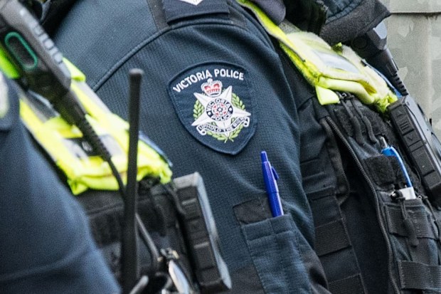 Victoria Police badge crime
