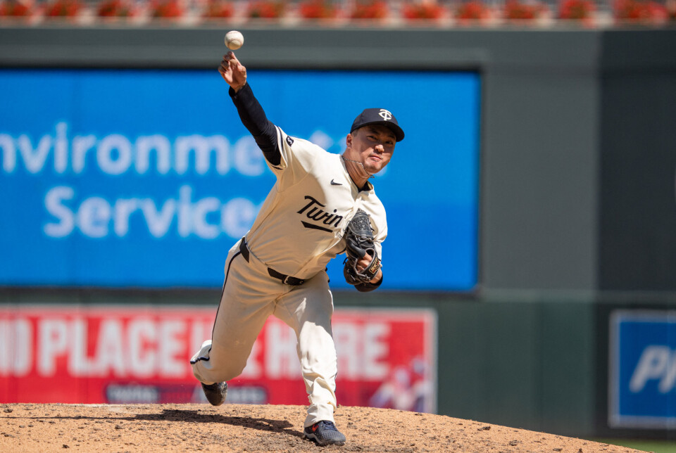 Jul 11, 2026; Minneapolis, Minnesota, USA; Minnesota Twins relief pitcher Woosuk Go (1) delivers to Los Angeles Angels second baseman Vaughn Grissom (5) in the eighth inning at Target Field. Mandatory Credit: Matt Blewett-Imagn Images/2026-07-12 06:48:21/