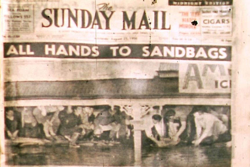a snapshot of a newspaper front page from 1956