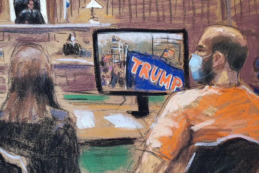 A courtroom sketch of a man in an orange prison uniform watching the Jan 6 riots on a screen.