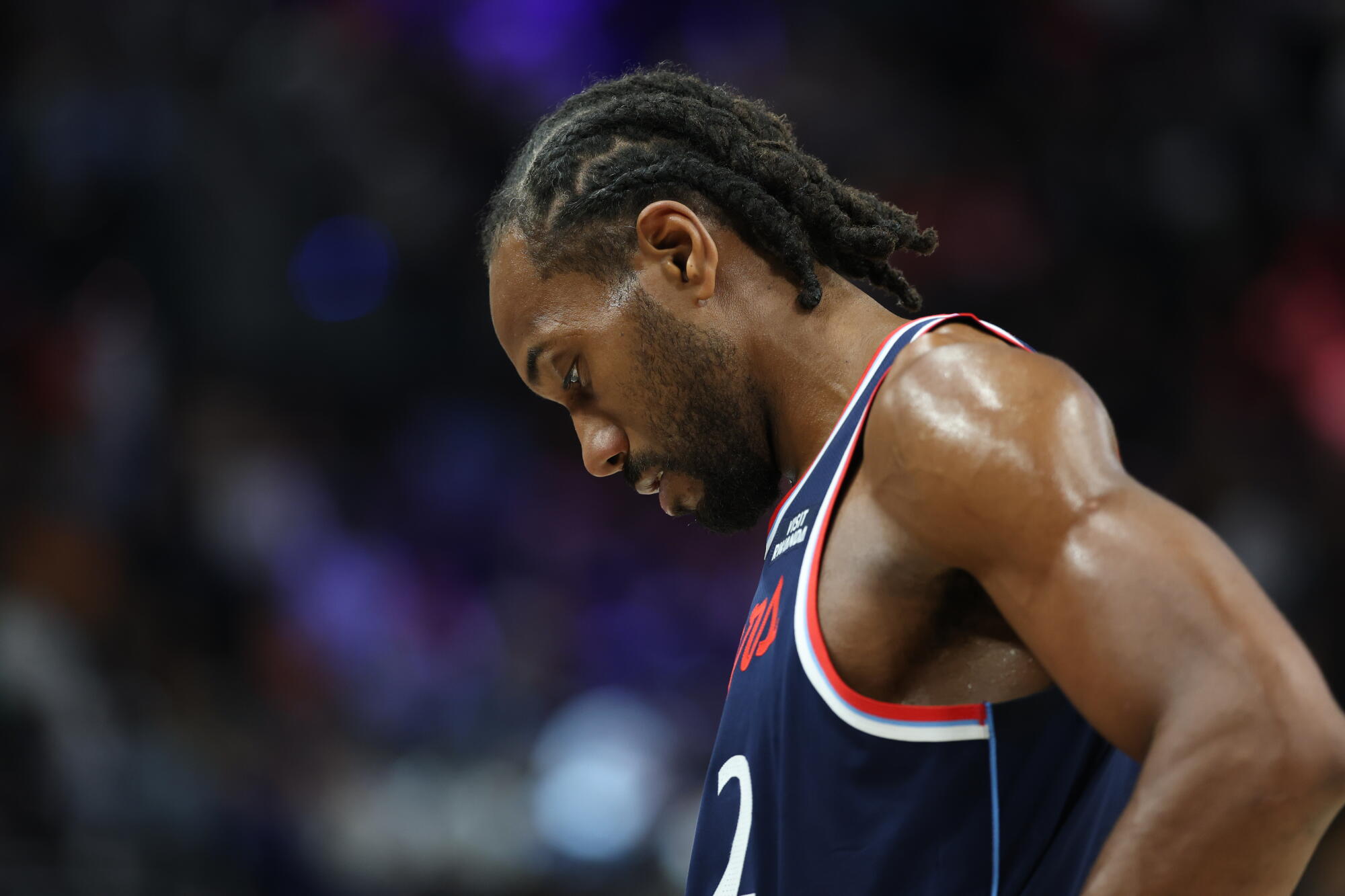 The Clippers' Kawhi Leonard looks down during a game against the Golden State Warriors at Intuit Dome on Jan. 05, 2026.