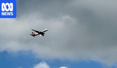 Sydney-bound Qantas passenger flight diverted after flames appear to be coming from plane