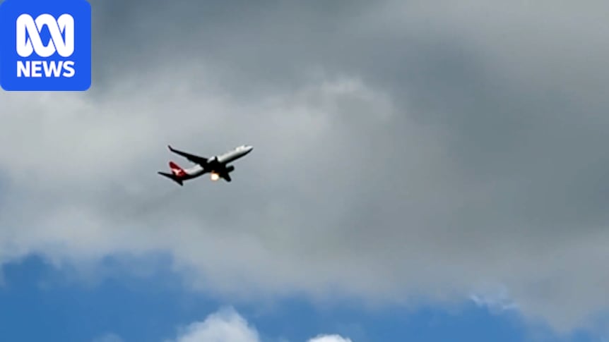 Sydney-bound Qantas passenger flight diverted after flames appear to be coming from plane