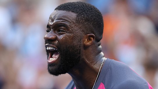 American Frances Tiafoe celebrates defeating Daniil Medvedev to reach the US Open quarter-finals.