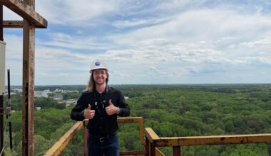 Jaden Caradine standing atop the gantry at NASA Langley's Impact Dynamics Facility