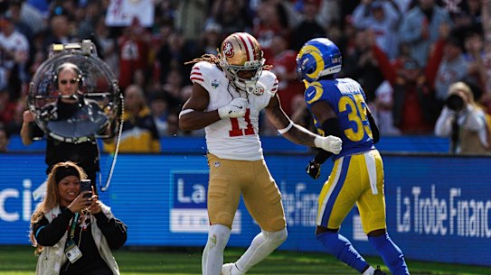 49ers wide receiver Demarcus Robinson celebrates a touchdown.