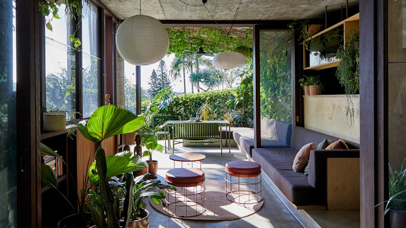 A heritage-listed home blends modernist influences with expansive Sydney Harbour views