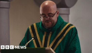 Manchester priest's sermon lands cameo role in Oasis documentary - BBC