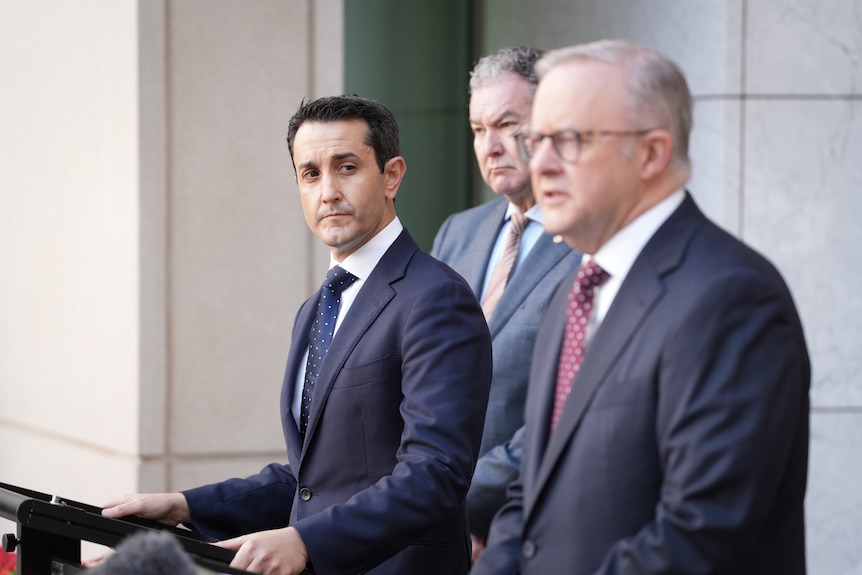 queensland premier david crisafulli standing next to anthony albanese