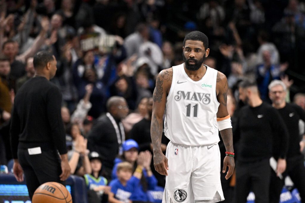 Feb 21, 2025; Dallas, Texas, USA; Dallas Mavericks guard Kyrie Irving (11) looks on after he makes a three point shot against the New Orleans Pelicans during the second half at the American Airlines Center. Mandatory Credit: Jerome Miron-Imagn Images