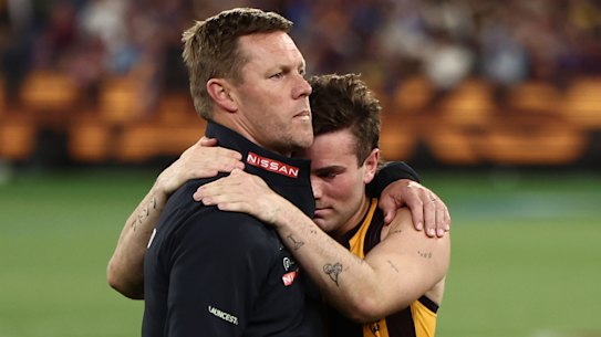 Hawthorn coach Sam Mitchell and gutted superstar Nick Watson after an MCG classic to remember.