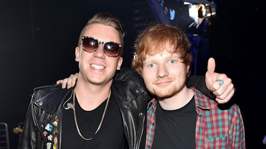 Macklemore and Ed Sheeran, pictured in 2014. Four other of Sheeran’s opening acts have dropped out of his tour supporting Macklemore.