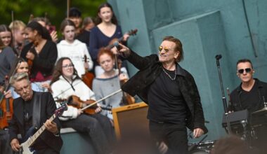 U2 rock their old school with surprise concert to mark 50 years