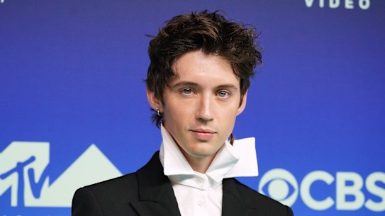 Troye Sivan makes a splash as he arrives at the awards.  
