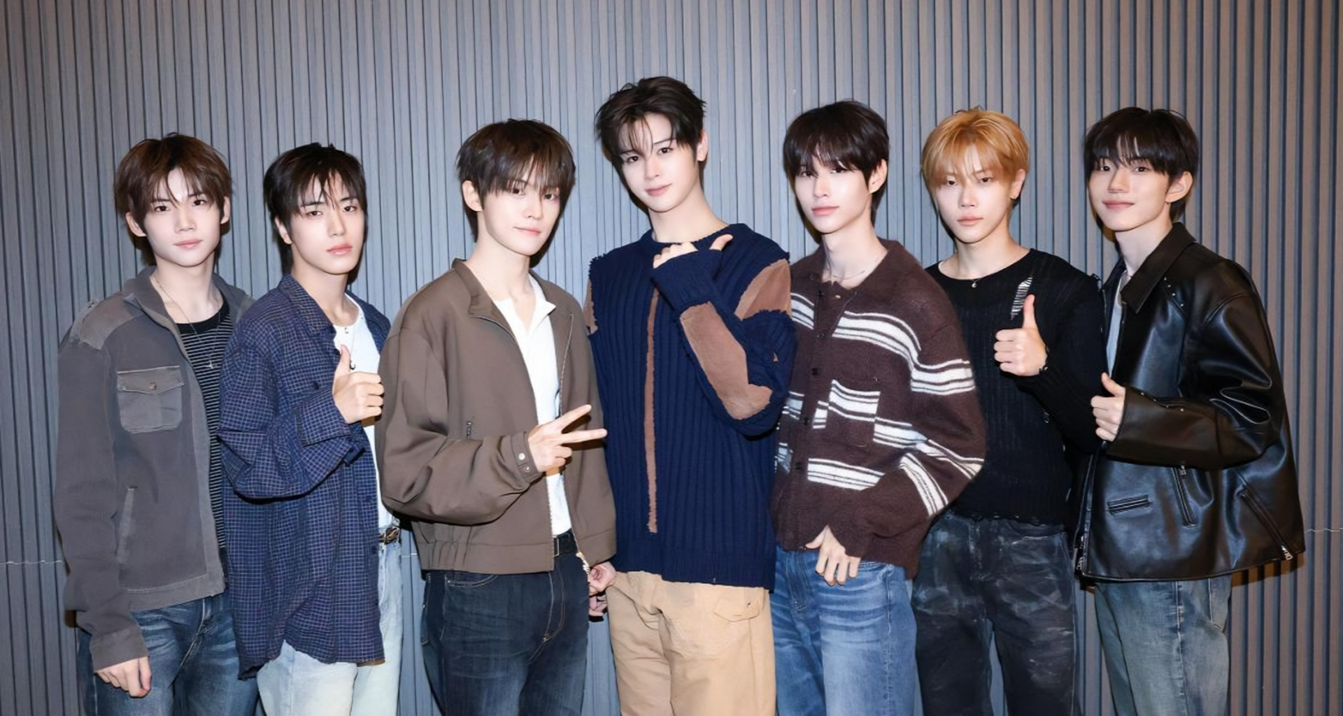 Members of K-pop boy band CLOSE YOUR EYES, from left, Kenshin, Song Seung-ho, Jeon Min-wook, Ma Jingxiang, Kim Sung-min, Jang Yeo-jun and Seo Kyoung-bae, pose during a press conference at a hotel in Seoul