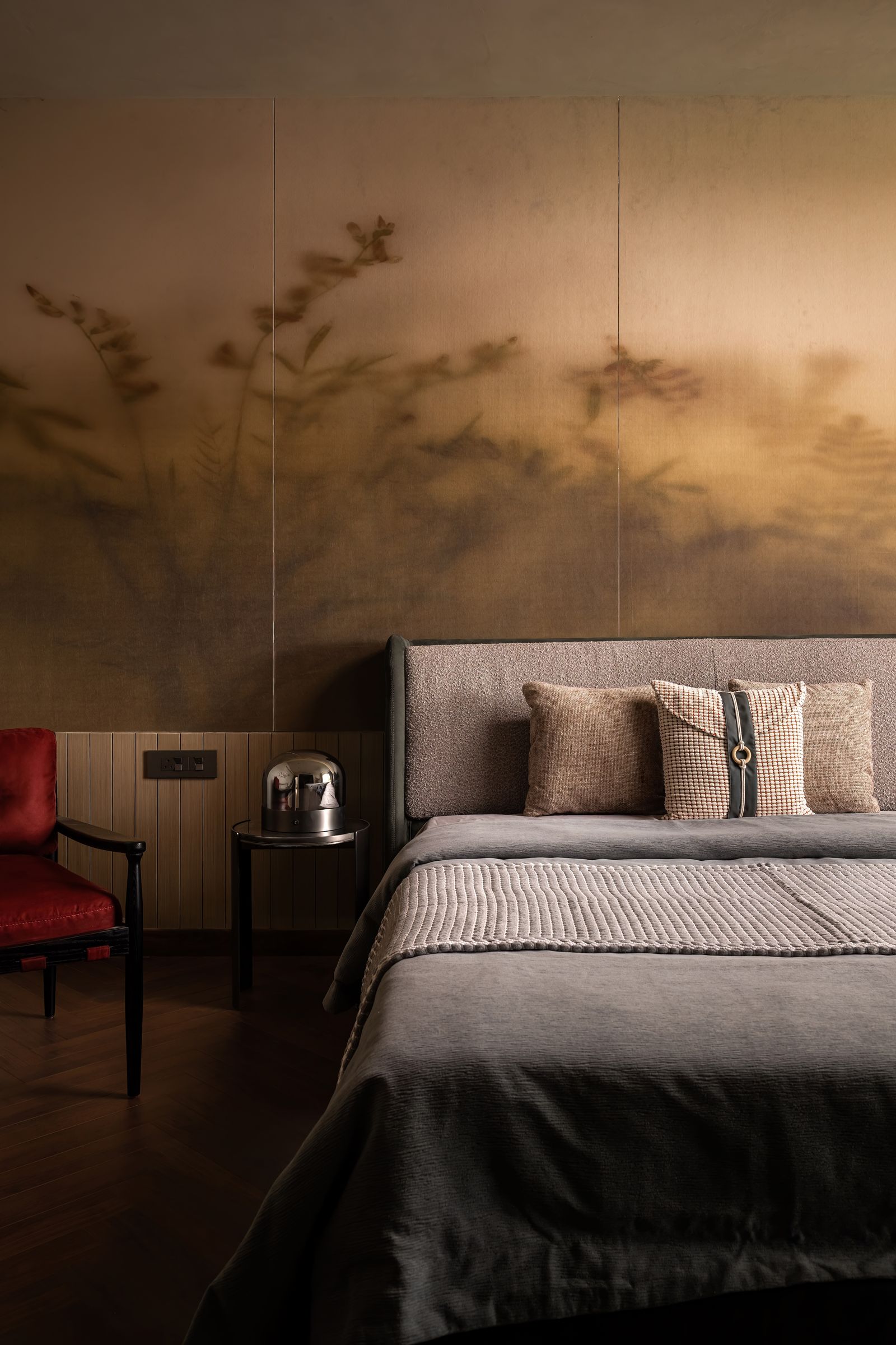 Image may contain Indoors Interior Design Cushion Home Decor Chair Furniture Architecture Building Wall and Bed