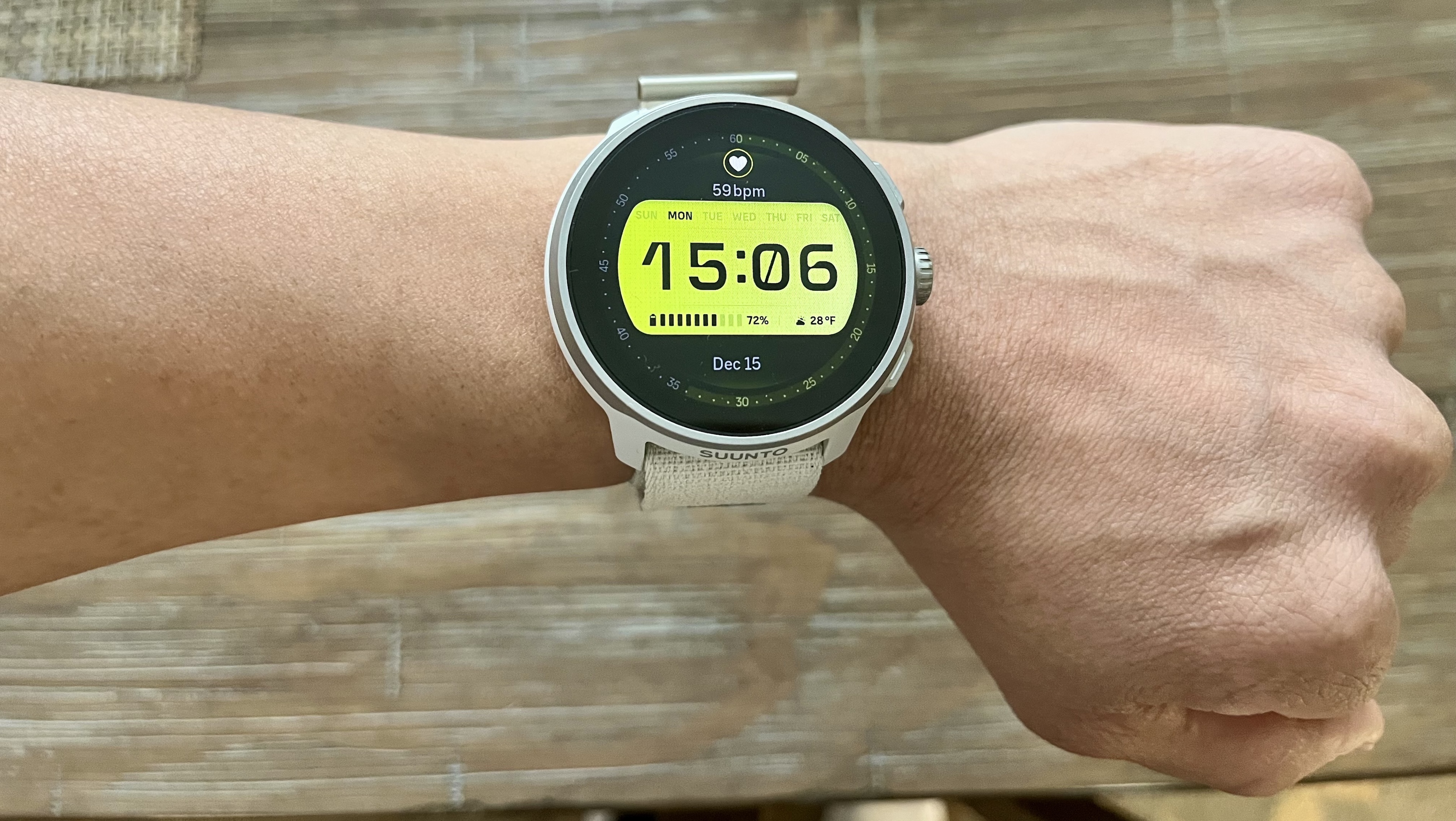 The Suunto Run Watch on a wrist.