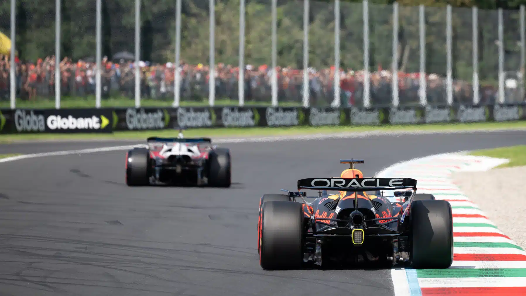 Max Verstappen (Red Bull-Honda) and Charles Leclerc (Ferrari) seen from behind during practice for the 2025 Italian Grand Prix