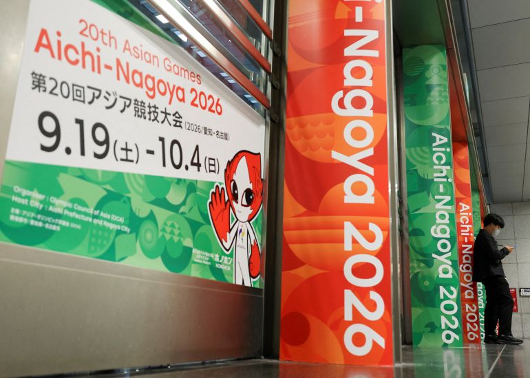 FILE PHOTO: Signages of the 20th Asian Games Aichi-Nagoya 2026 on display in Nagoya, central Japan May 21, 2026. REUTERS/Issei Kato/File Photo