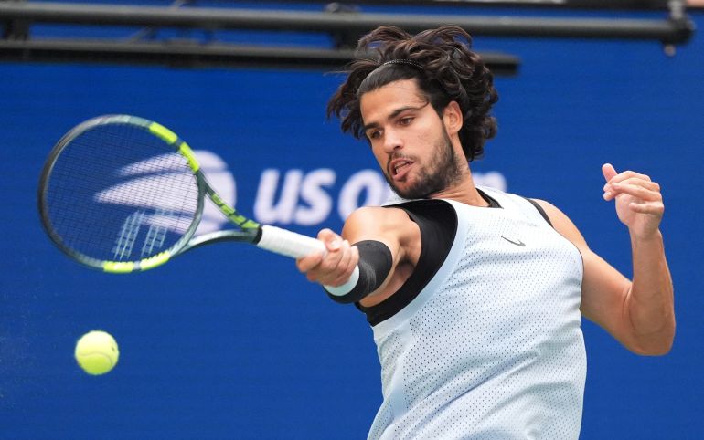 Spain's Carlos Alcaraz in action during his round of 16 match against Tommy Paul of the U.S