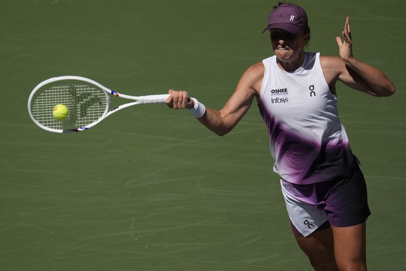 Tennis-Zheng mounts another fight back to stun Swiatek in fourth round | The Mighty 790 KFGO